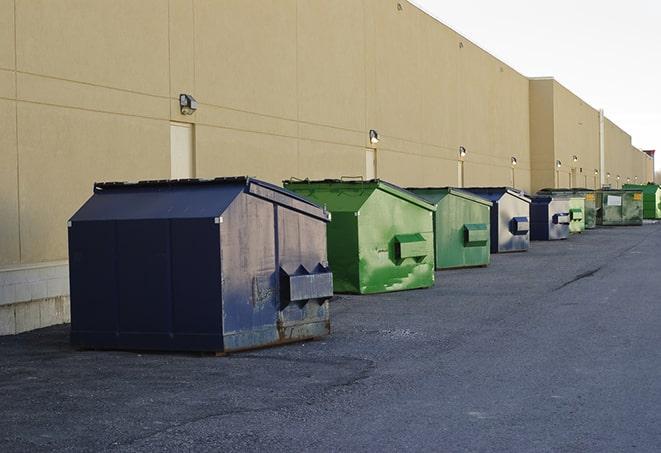 waste collection receptacles placed near a worksite in Allen